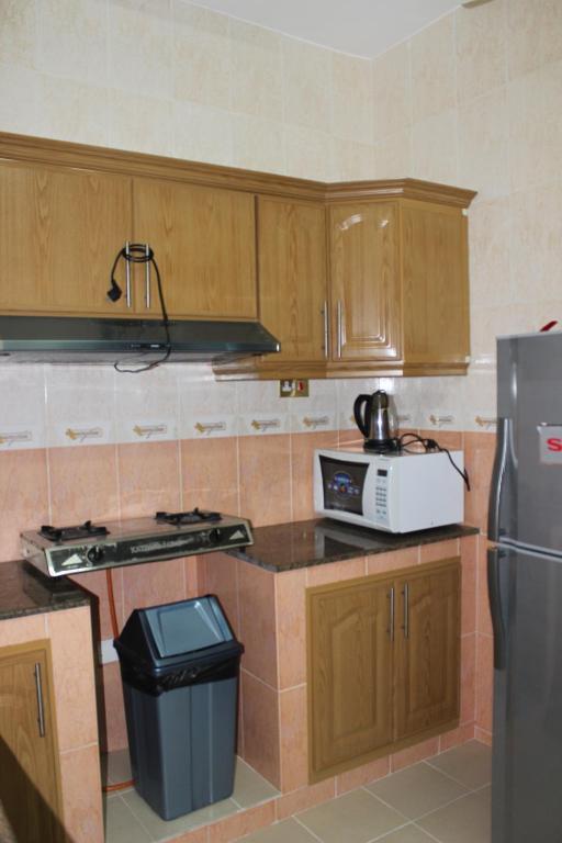 Gulf Crown Hotel Apartment Szíb Szoba fotó